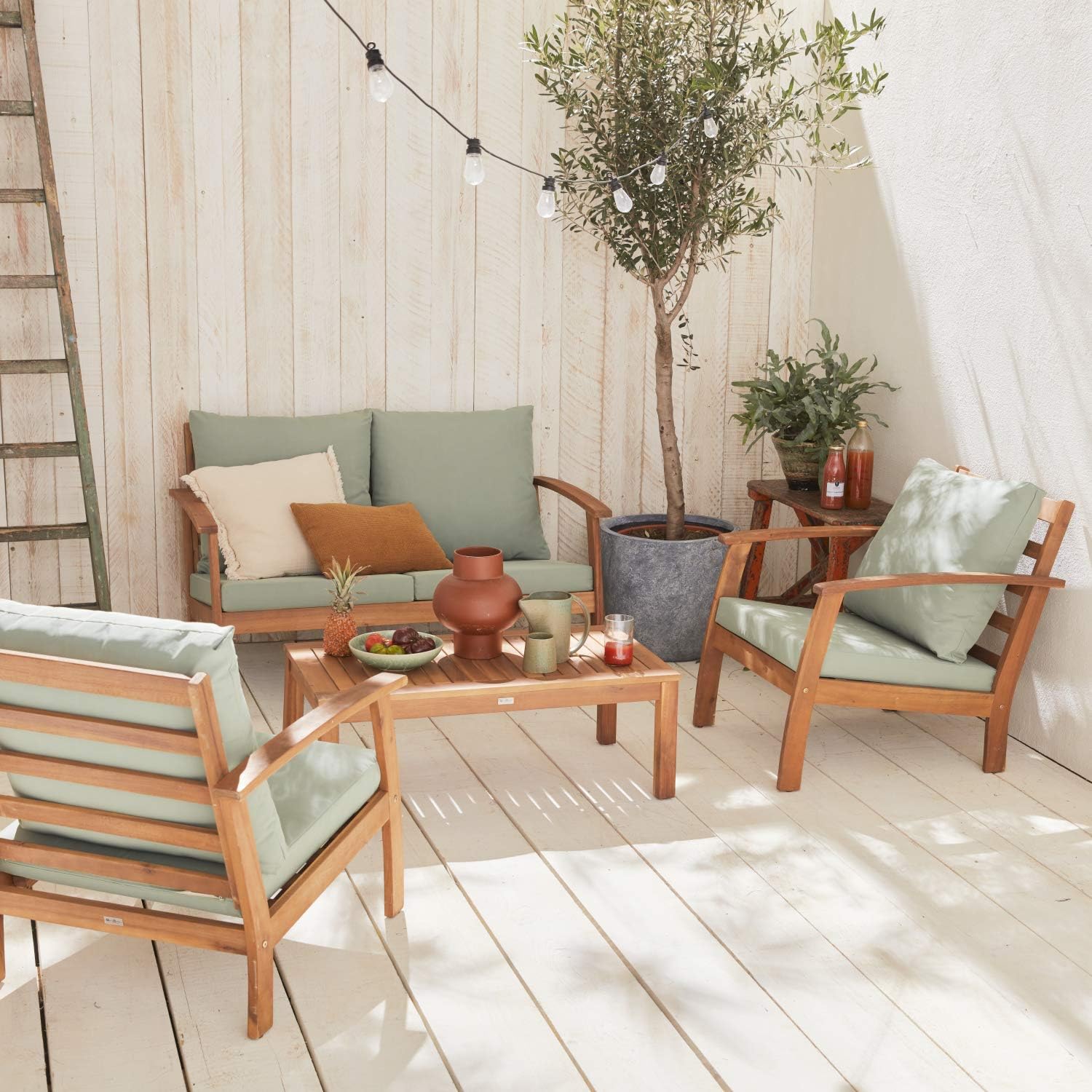 Salon jardin bois 4 places canapé fauteuils table basse acacia coussins vert de gris